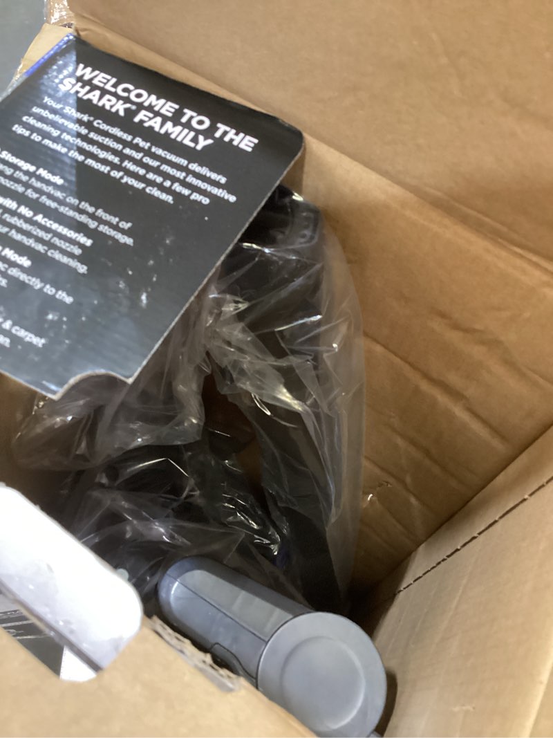 Condition photo showing As Is for shark rocket lightweight cordless stick vacuum (ix141), 7.5 lbs, blue iris (renewed)