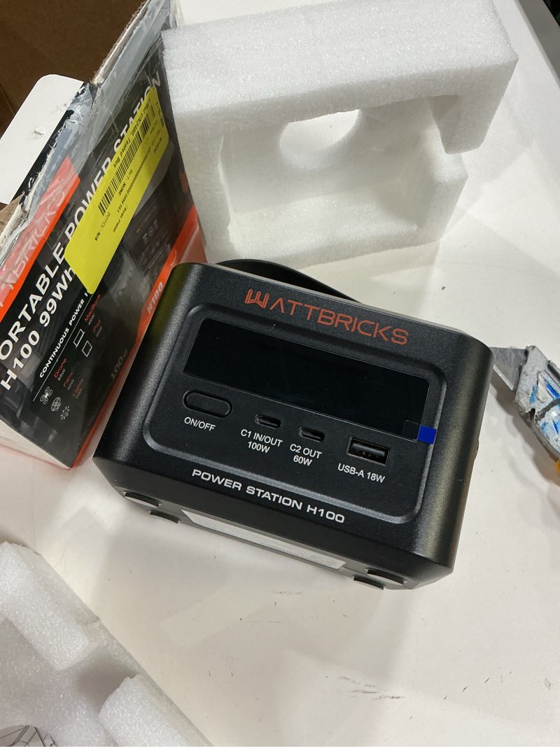 Condition photo showing As Is for wattbricks energy 120-watt peak with 99.2whr portable power station