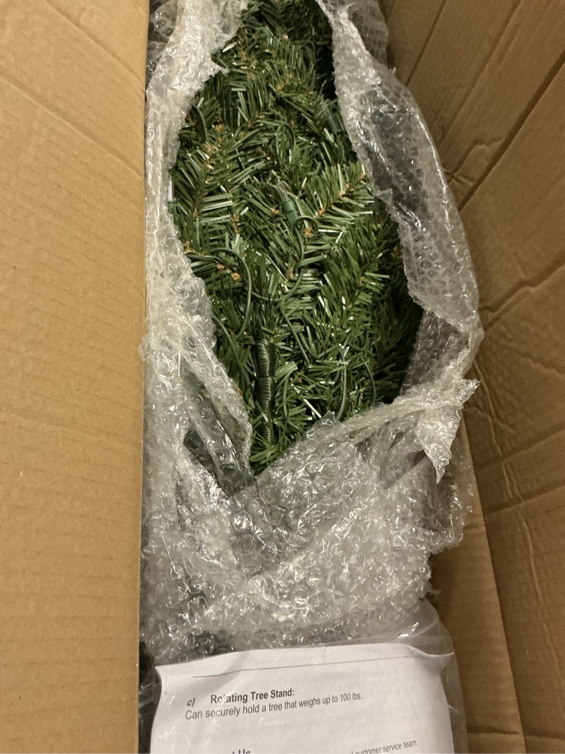 Condition photo showing As Is for puleo international 7.5ft pre-lit fraser fir pencil christmas tree with 350 clear lights, 1188 realistic dense branch tips, easy setup artificial trees with sturdy metal stand 7.5' pencil fraser fir with 350 clear lights