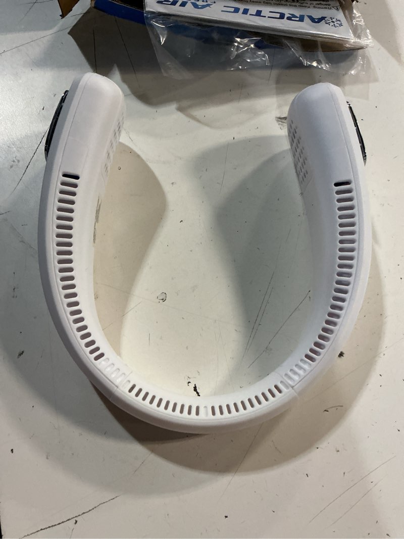 Condition photo showing As Is for arctic air freedom neck cooler, portable neck fan with 3 fan speeds, usb charging, 6-hour battery