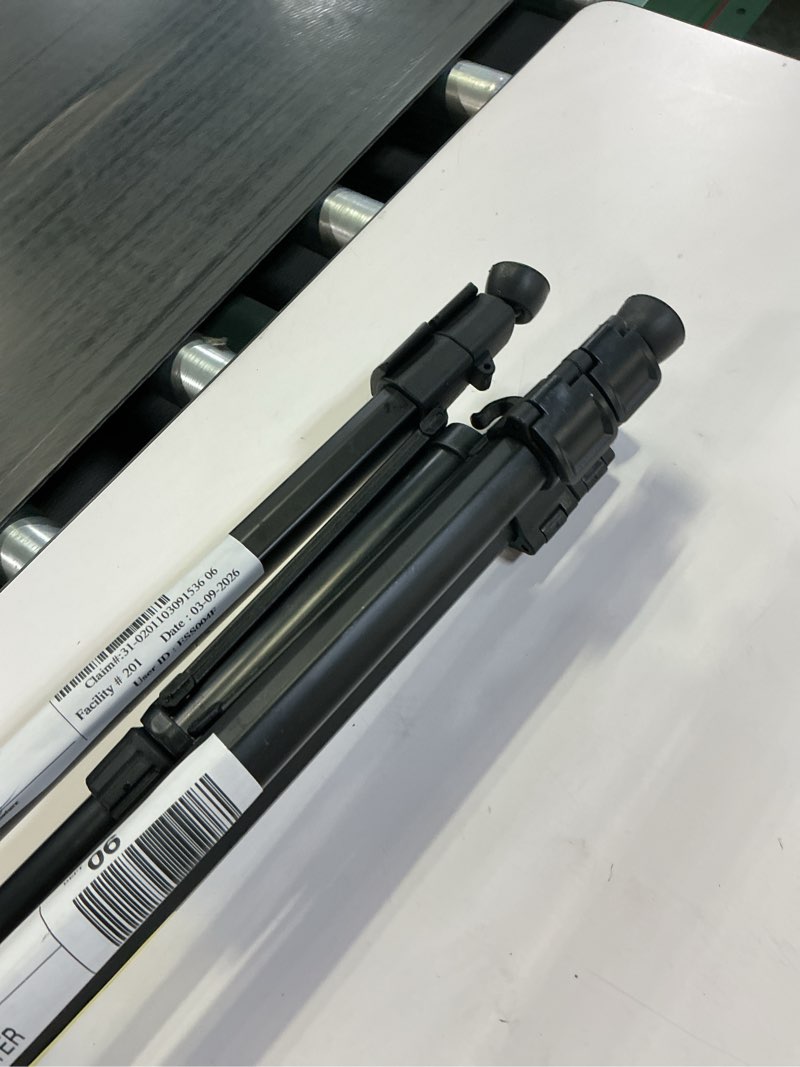 Condition photo showing As Is for similar to the photo reference, 62 in. portable lightweight aluminum camera tripod tripod with smartphone mount