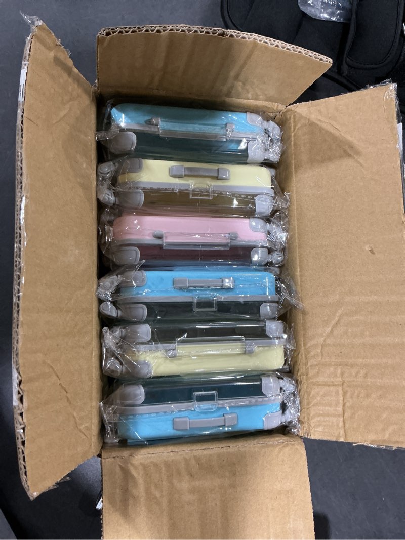 Condition photo showing item condition for MAQUITA 12 Pack Mini Suitcase Candy Box, Tiny Plastic Luggage, Mini Empty Suitcase Party Favor Box for Travel, Wedding, Family Vacation, Jewelry, Party, 4 Colors