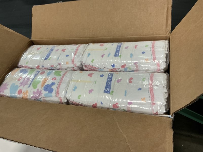 Condition photo showing New/Like New for huggies size 5 diapers, snug & dry baby diapers, size 5 (27+ lbs), 84 count, packaging may vary size 5 84
