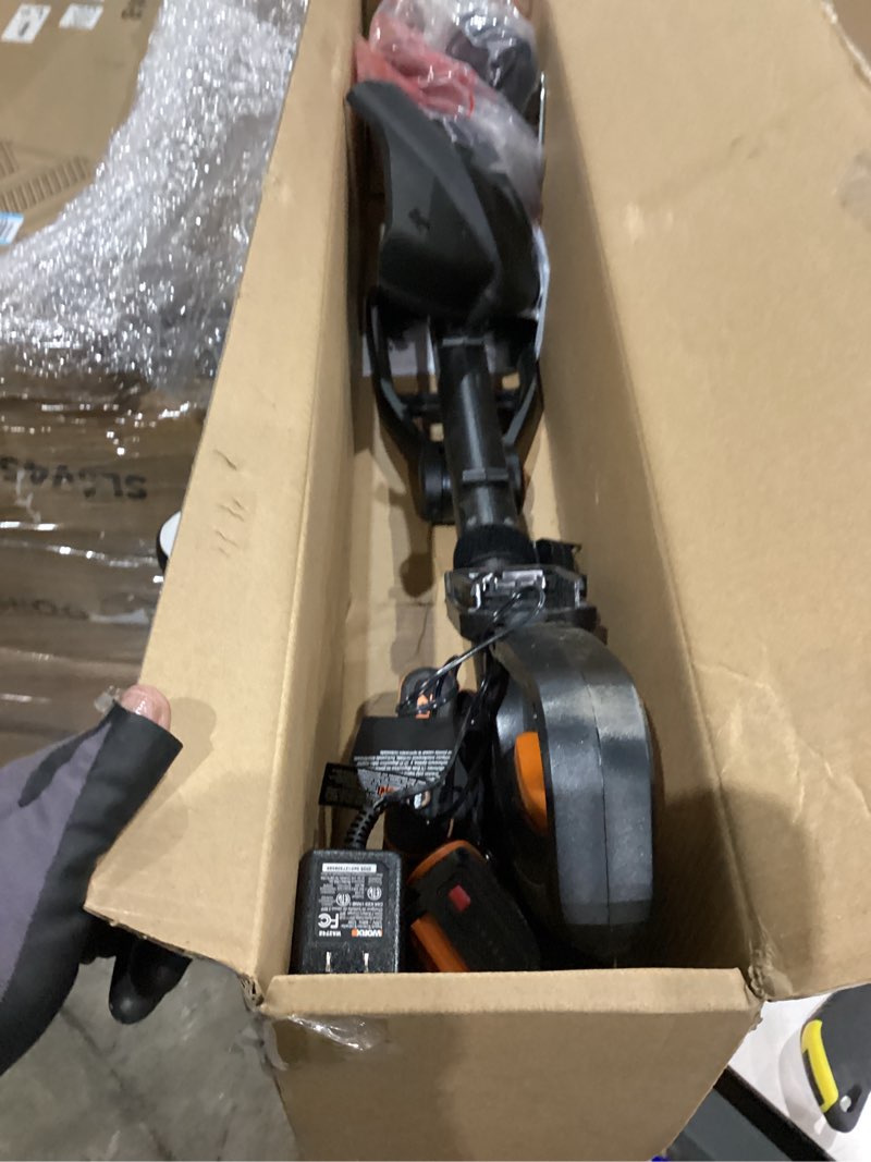 Condition photo showing As Is for Worx String Trimmer/Edger/Lawn Mower 3-in-1 Grass Trimmer GT Revolution 20V 12" (2 Batteries & Charger Included) WG170 12" Trimmer w/2.0 Ah Battery