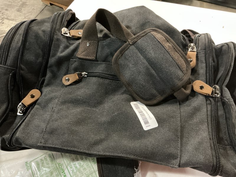Condition photo showing Good Condition for gonex canvas duffle bag for travel, expandable water resistant 50l carry on duffel overnight weekender gym bag with wet dry separation pocket & suitcase handle sleeve, dark grey dark grey large-50l