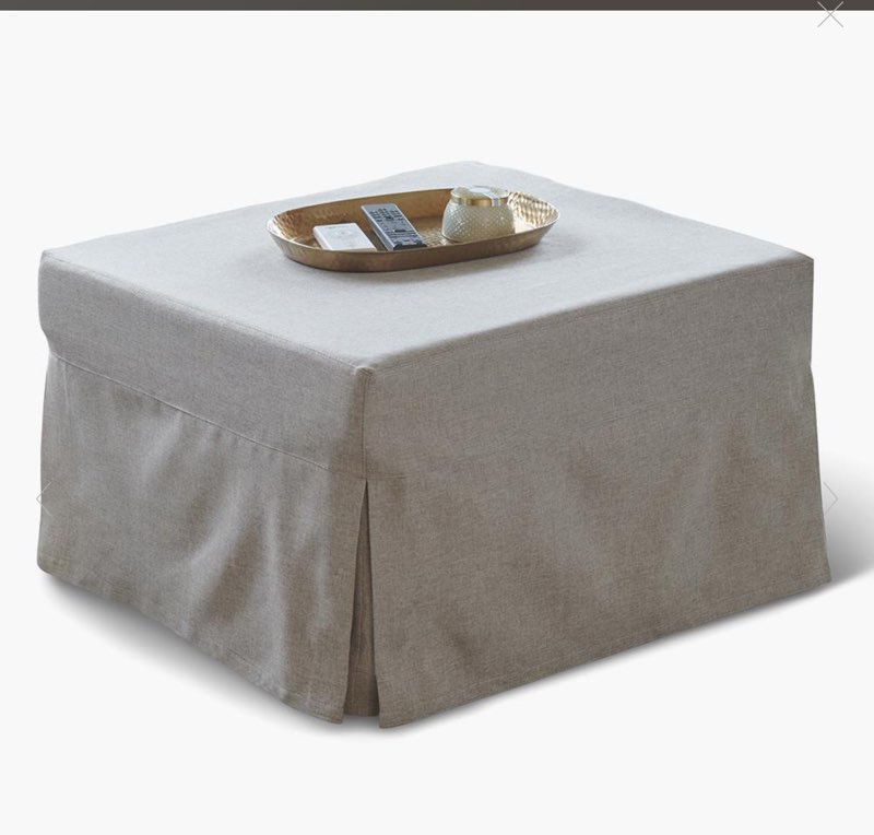The Cover For The Ottoman That Converts To A Bed