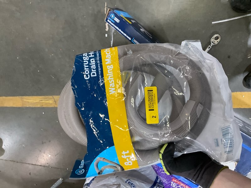 Condition photo showing As Is for eastman universal corrugated 8' washing machine drain hose 