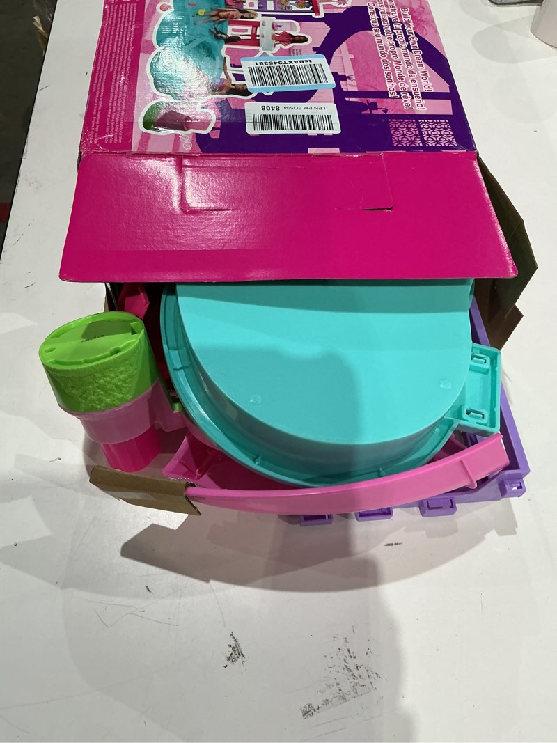 Condition photo showing As Is for barbie dream pool playset with 6 play areas, including slide & bubbling hot tub, plus 20+ accessories like pet, floaties & more