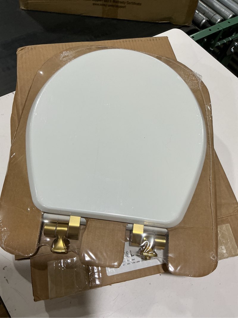 Condition photo showing New/Like New for mayfair bennett toilet seat with brushed gold hinges, slow close wood seat, secure metal hinges, easy install, made in usa, round, white round gold