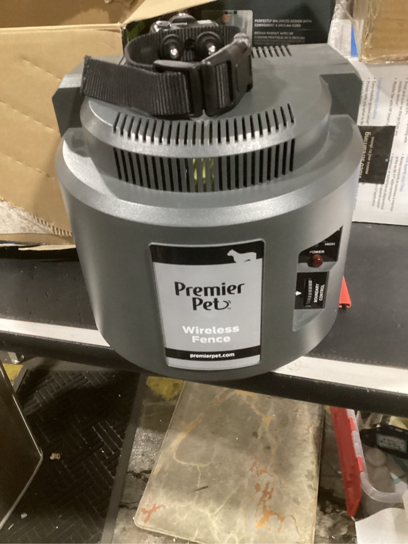 Condition photo showing As Is for (incomplete) premier pet wireless dog fence system - adjustable circular boundary up to ½ acre - waterproof collar with tone & 5 static levels - no digging - expandable to include multiple dogs