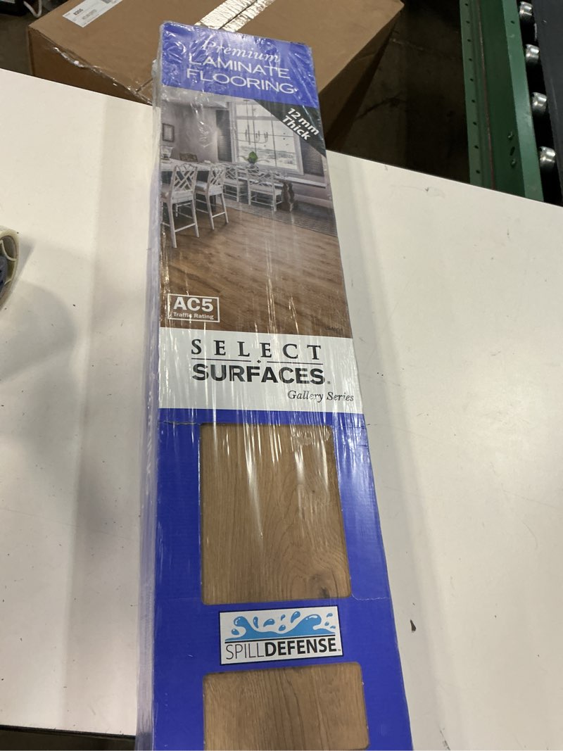 Condition photo showing New/Like New for select surfaces victoria spilldefense laminate flooring, 17.49 sq. ft. per box