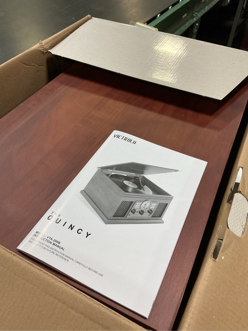 Condition photo showing As Is for Victrola The Quincy 6-in-1 Bluetooth Record Player & Multimedia Center with Built-in Speakers – 3-Speed Turntable, CD & Cassette Player, AM/FM Radio, Wireless Music Streaming (Mahogony) Mahogany Record Player