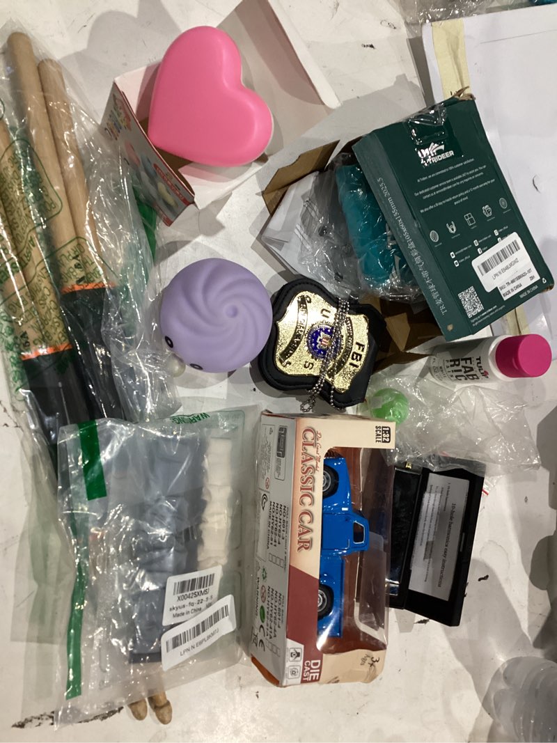 Condition photo showing As Is for assorted lot of toys and games 