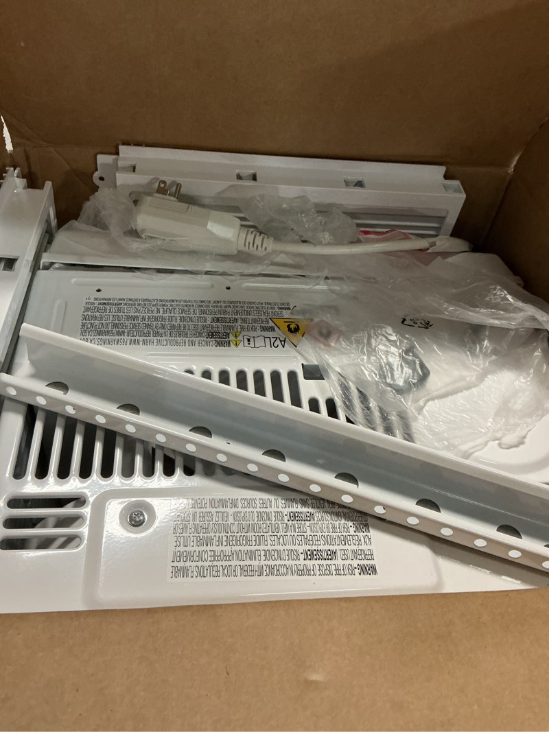 Condition photo showing As Is for amazon basics 5000-btu small window air conditioner, up to 150 sqf, window ac units with cool and fan functions, washable filter, adjustable window kit, intuitive mechanical controls, white white 5000 btu