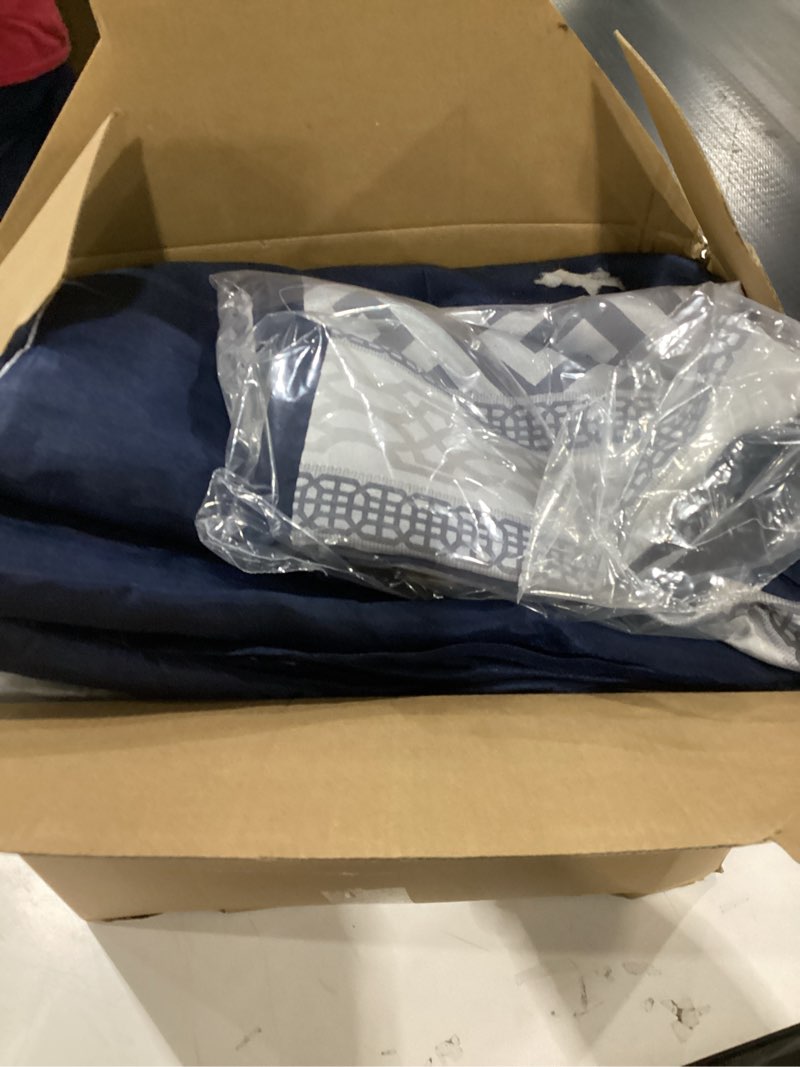 Condition photo showing As Is for Madison Park Luxury Comforter Set-Traditional Jacquard Design All Season Down Alternative Bedding, Matching Bedskirt, Decorative Pillows, King(104"x92"), Bennett, Geometric Navy 7 Piece Geometric Navy King(104"x92")