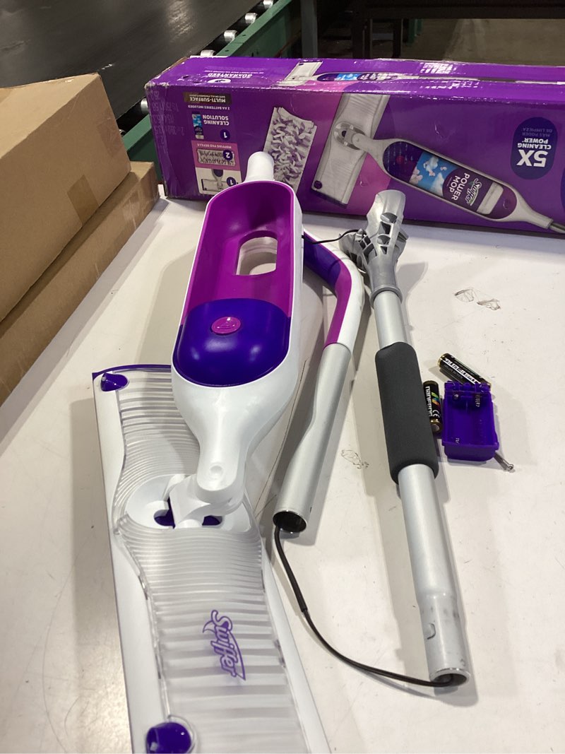 Condition photo showing As Is for swiffer powermop multi-surface mop kit for floor cleaning, fresh scent, mopping kit includes powermop, 2 mopping pad refills, 1 floor cleaning solution with fresh scent and 2 batteries purple and white