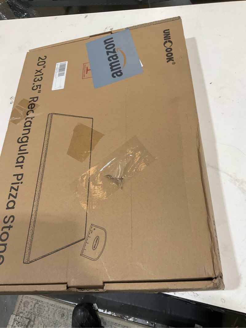Condition photo showing Good Condition for unicook 20 x 13.5 inch extra large pizza stone for oven and grill, 10.6 lbs | heavy duty, even heating&consistent heat retention, crispy crust for 2 small pizzas, bread, cookies, includes dough scraper 20" x 13.5" rectangular