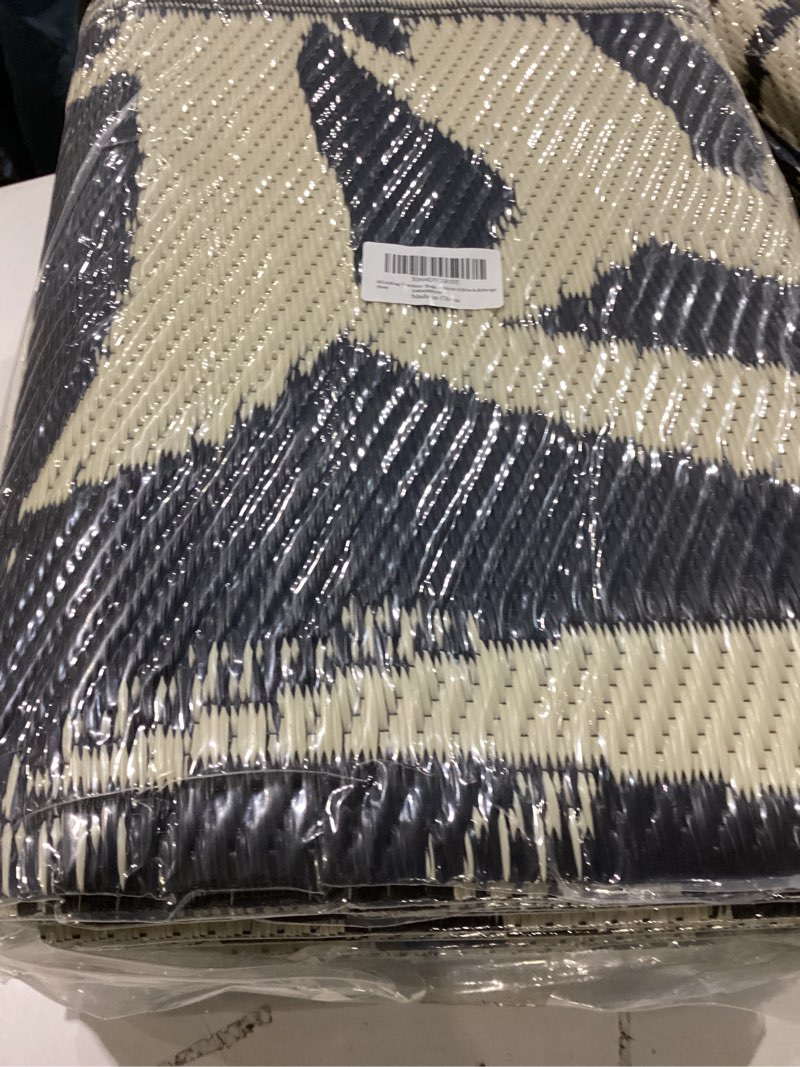 Condition photo showing New/Like New for Outdoor Rug Waterproof for Patios Clearance, Reversible Outdoor Plastic Straw Rug Camping Carpet, Outside Floor Mats Large Area Rugs for RV,Patio,Deck,Porch,Beach, Balcony?8'x10',Black&Beige 8' x 10' (Rectangular) Black&beige