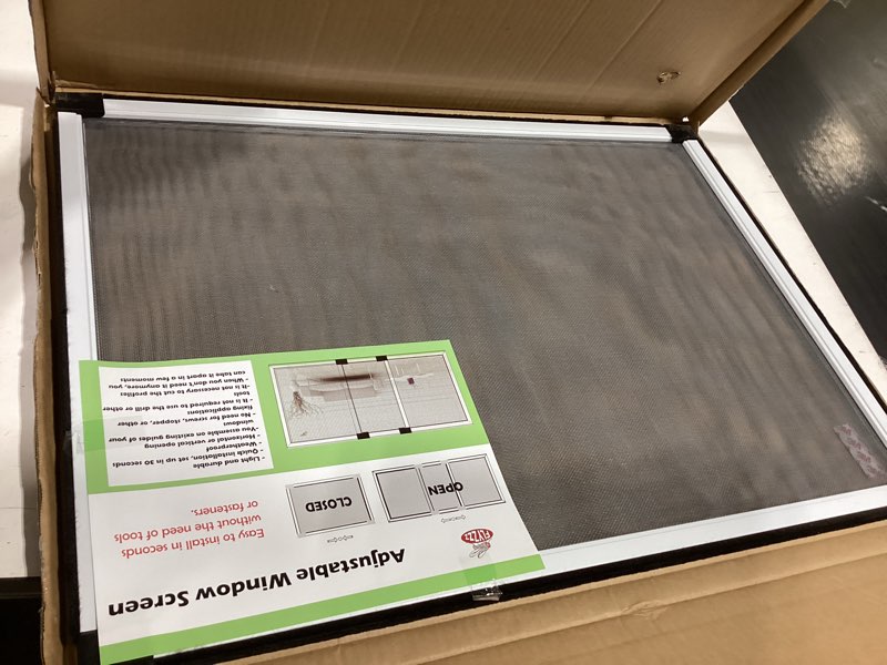Condition photo showing Good Condition for flyzzz adjustable window screen horizontal (19.68"h x 28"-52"w) 1 pack expandable window screen large replacement for home 19.68 inches high by 28-52 inches wide 1 pack