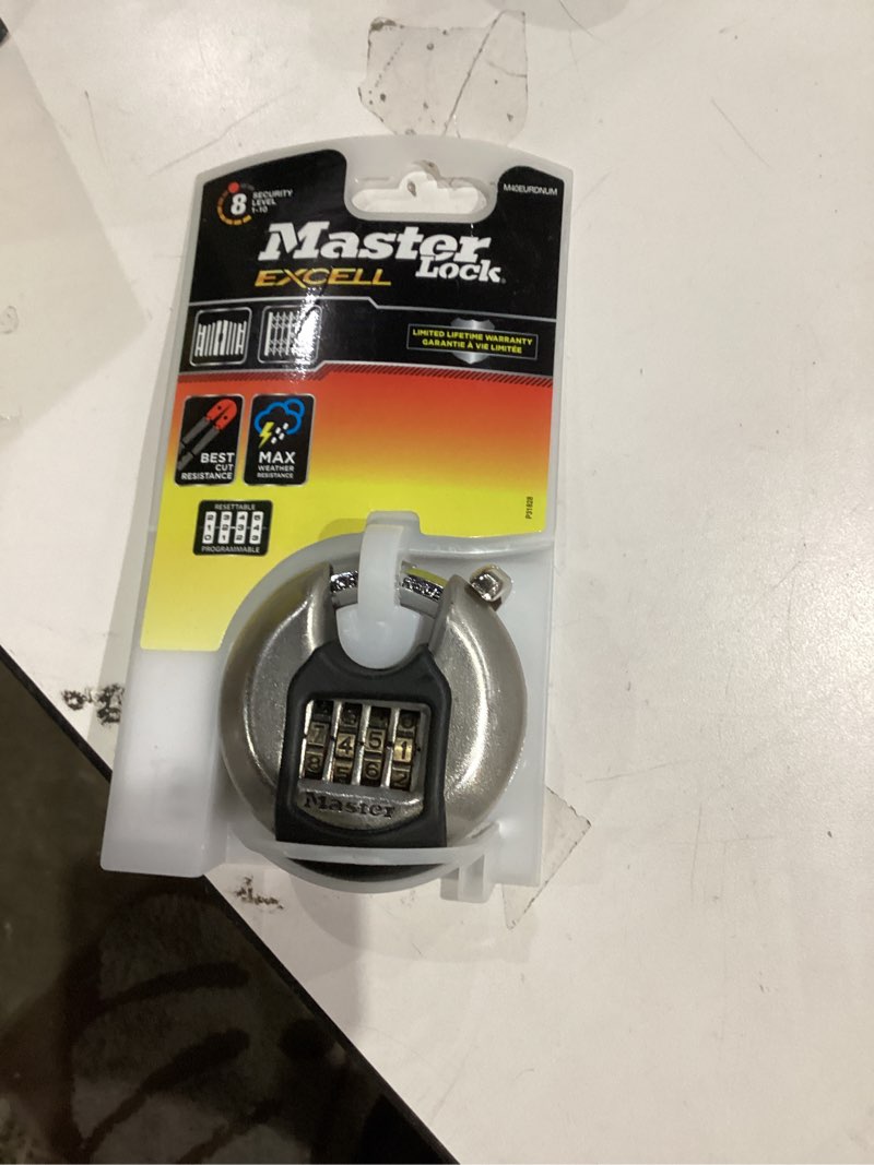Condition photo showing New/Like New for Master Lock Heavy Duty Disc Padlock [Combination] [Stainless Steel] [Outdoor] M40EURDNUM - Best Used for Storage Units, Sheds, Garages, Trailers and More