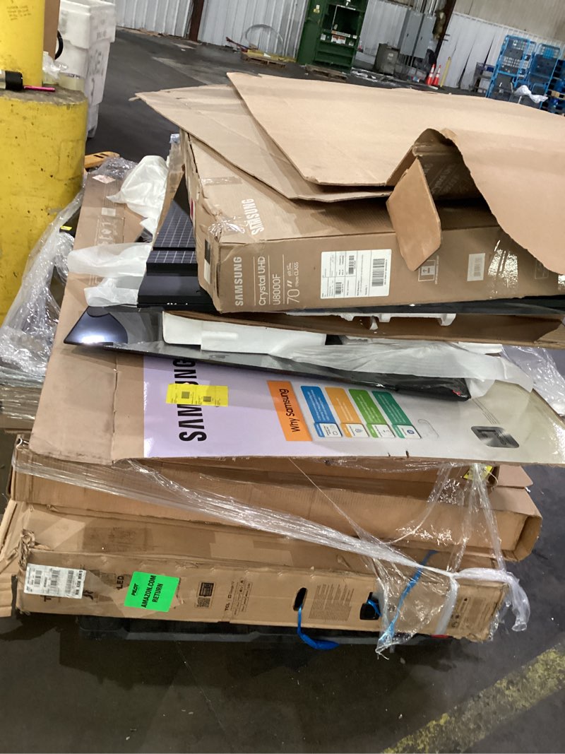 Condition photo showing As Is for pallet of (incomplete and damaged ) televisions