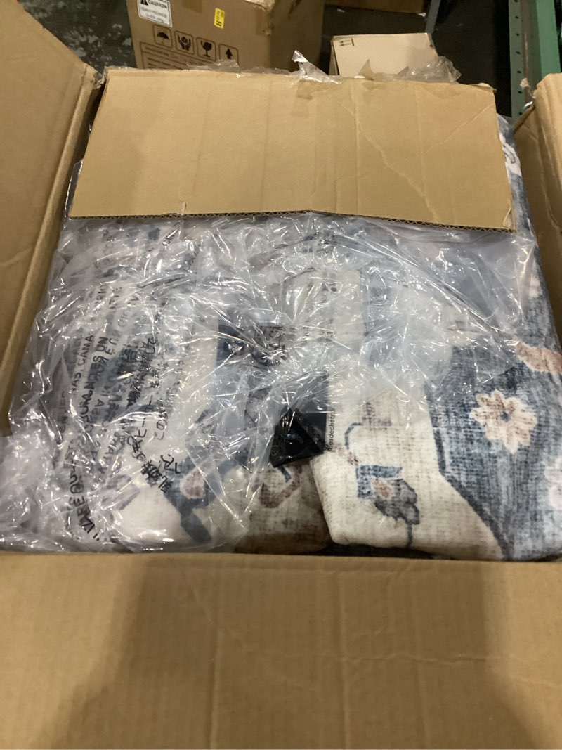 Condition photo showing Good Condition for amada homefurnishing 8x10 washable area rug, low-profile with non-slip backing & durable edge binding, vintage large rugs for living room, bedroom, dining room, blue 8' x 10' (rectangular) blue