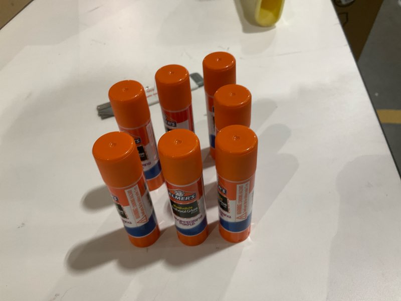 Condition photo showing As Is for Elmer's Disappearing Purple School Glue Sticks, Washable, 6 Grams, 12 Count - Poster, Vision Board, Back to School, #1 Teacher Brand 12 Count - Disappearing Purple