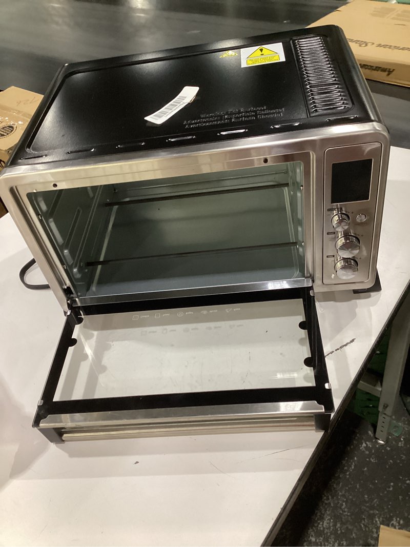 Condition photo showing As Is for (used, not tested, door doesnt stay shut) toshiba ac25cew-ss large 6-slice convection toaster oven countertop, 10-in-one with toast, pizza and rotisserie, 1500w, stainless steel, includes 6 accessories stainless steel 25l