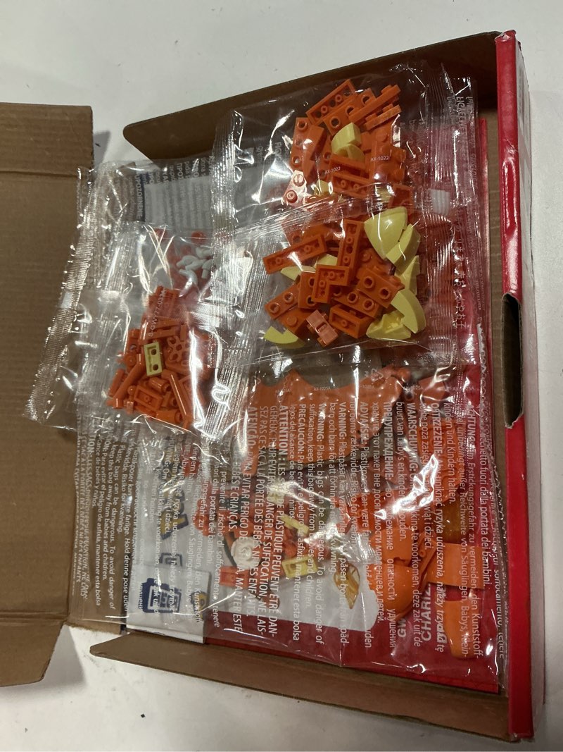 Condition photo showing New/Like New for mega pokemon charizard construction set 222pc