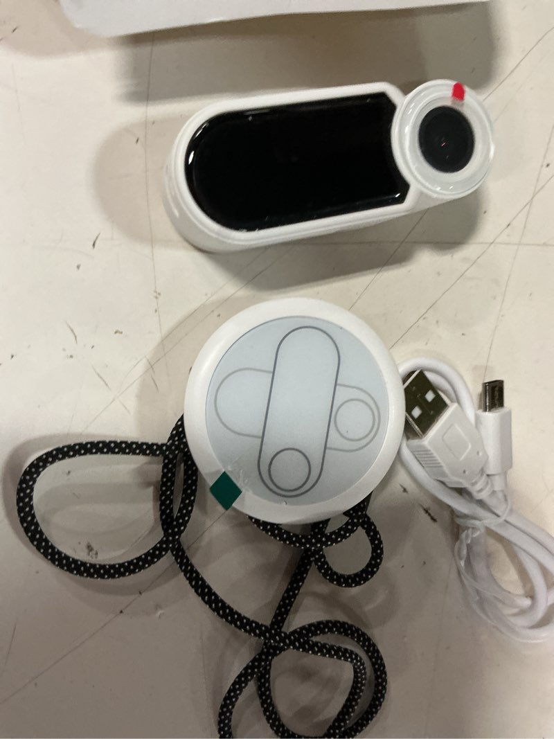 Condition photo showing Good Condition for 2.7k 64g thumb action camera mini body camera with magnetic lanyard for hands-free pov vlogging outdoor sports recording video camera for cycling, traveling, running (white)