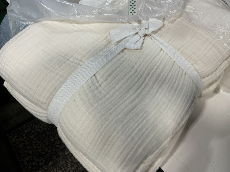 Condition photo showing As Is for quince organic cotton gauze blanket, king/cal king, undyed