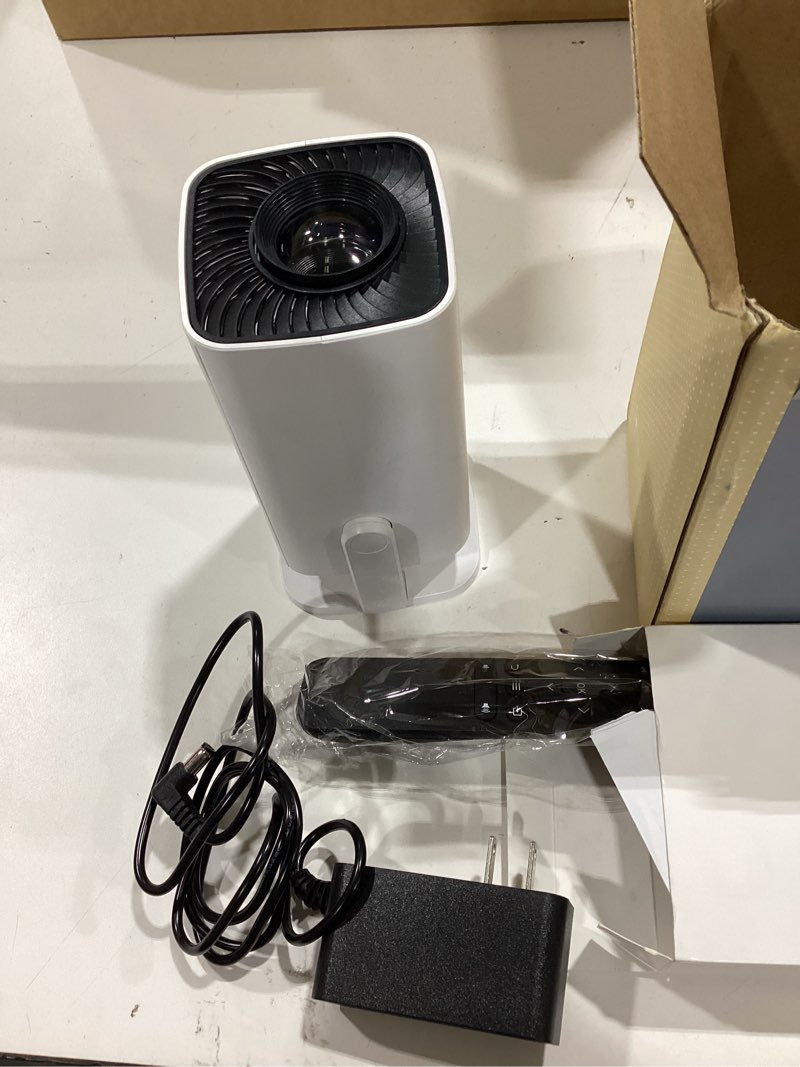 Condition photo showing Good Condition for mini projector, portable projector 4k & full hd 1080p support, 270° rotation outdoor projector, movie projector compatible with smartphone, tv stick, laptop, ps4, hdmi, usb ivory