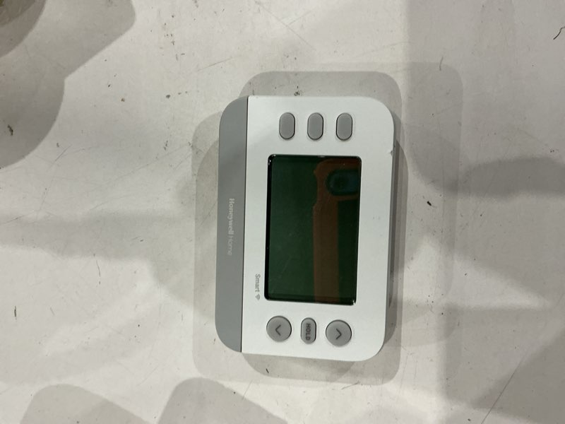 Condition photo showing As Is for honeywell home x2s smart built in wifi heating and cooling push button smart-enabled programmable th