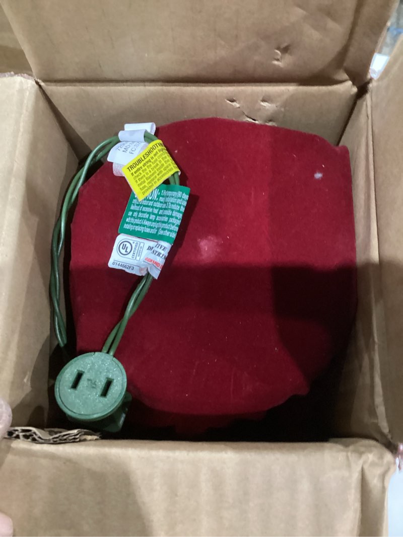 Condition photo showing As Is for National Tree Company 24 in Pre-Lit Majestic Fir Mini Artificial Christmas Tree, 35 Clear Lights, 71 Tips, Red Cloth Base, Green Plug in w/Red Bag Tree