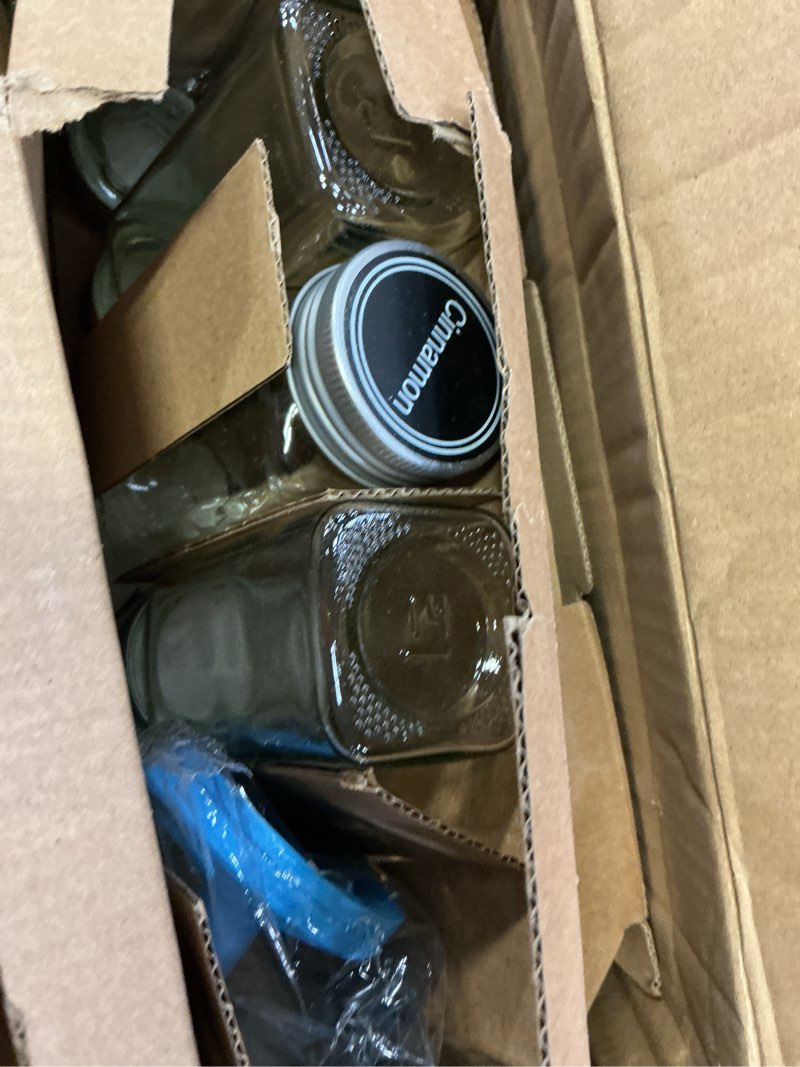 Condition photo showing As Is for SpaceAid Spice Rack Organizer with 28 Spice Jars, 386 Spice Labels, Chalk Marker and Funnel Set for Cabinet, Countertop, Pantry, Cupboard or Door & Wall Mount - 28 Jars, 13.4" W × 10.8" H, Black 28 Jars, 13.4"W × 10.8"H Black