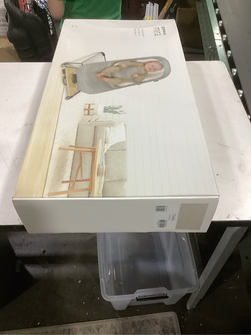 Condition photo showing New/Like New for UPPAbaby Mira Bouncer/Portable 2-in-1 Bouncer + Seat Grows With Your Baby/GREENGuard® Gold, JPMA + FSC® certified/Cozy Seat Liner + Storage Bag Included/Charlie (Sand Mélange/Black Chrome/Walnut Wood)