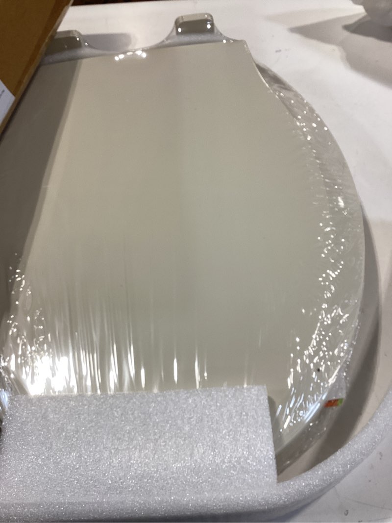 Condition photo showing Good Condition for similar to bemis elongated enameled wood toilet seat in biscuit with easy•clean? hinge