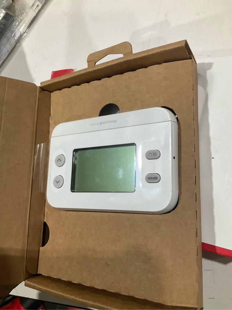 Condition photo showing As Is for honeywell home x1n heating and cooling push button non-programmable thermostat