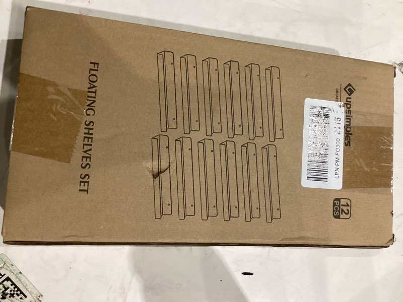 Condition photo showing Good Condition for upsimples 6 Pack Acrylic Shelves for Wall Storage, 15" x 4“ Floating Bookshelves for Kids, Display Shelf Organizer for Bathroom, Bedroom, Living Room, Kitchen, Room Decor, Clear 6 15x4"