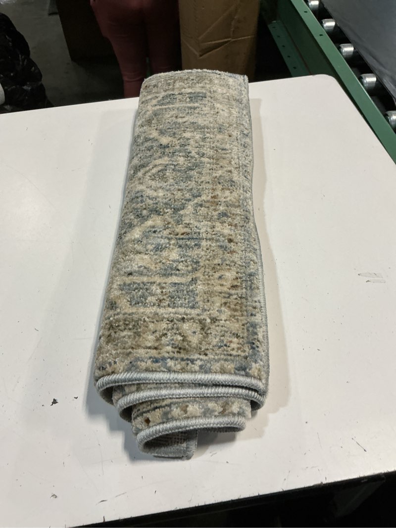 Condition photo showing As Is for loloi magnolia home by joanna gaines junie collection jue-01 blue/natural 2'-0" x 3'-0", .38" pile height, accent rug blue / natural 1' x 3' (rectangular)