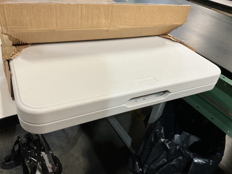 Condition photo showing New/Like New for byliable folding table 4 foot portable heavy duty plastic fold-in-half utility table small indoor outdoor adjustable height folding with carrying handle, camping and party,white | portable, heavy duty, fold-in-half, indoor outdoor, adjustable height, folding white 4ft