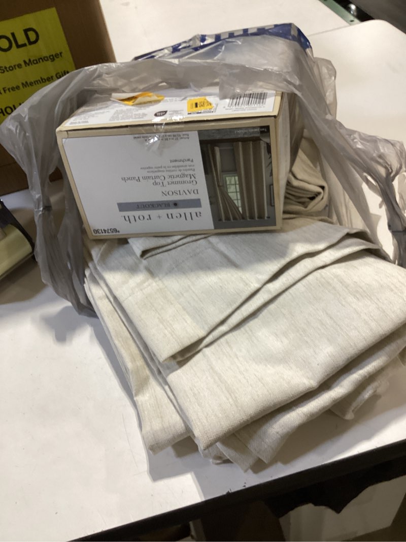 Condition photo showing Good Condition for allen + roth 84-in Parchment Blackout Grommet Curtain panel pair 