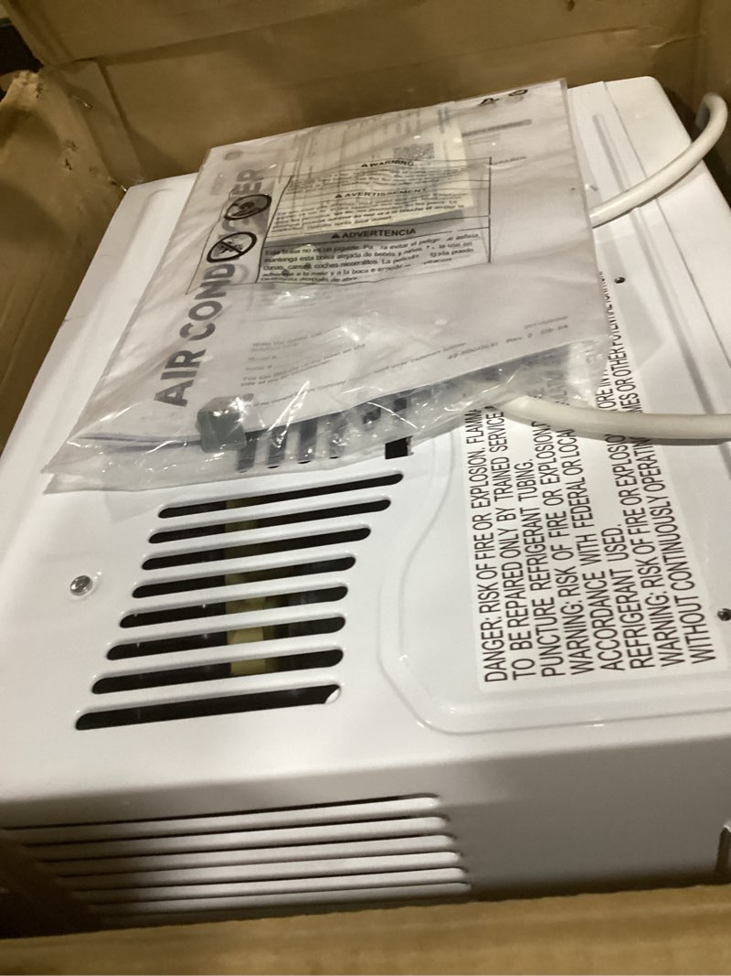 Condition photo showing Good Condition for ge window air conditioner unit, 5,000 btu for small rooms up to 150 sq ft. with manual adjustable fan and cooling settings, perfect for small bedroom or living room, easy install kit included, white new 5,000 btu mechanical controls white