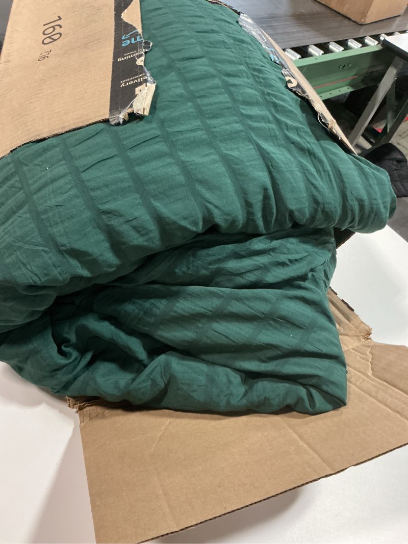 Condition photo showing As Is for CozyLux King Size Comforter Set Emerald Green Seersucker 7 Pieces Bed in a Bag King Comforter Set with Sheets, Luxury Soft Bedding Set with Down Alternative Comforter, Sheets, Pillowcases & Shams Emerald Green King