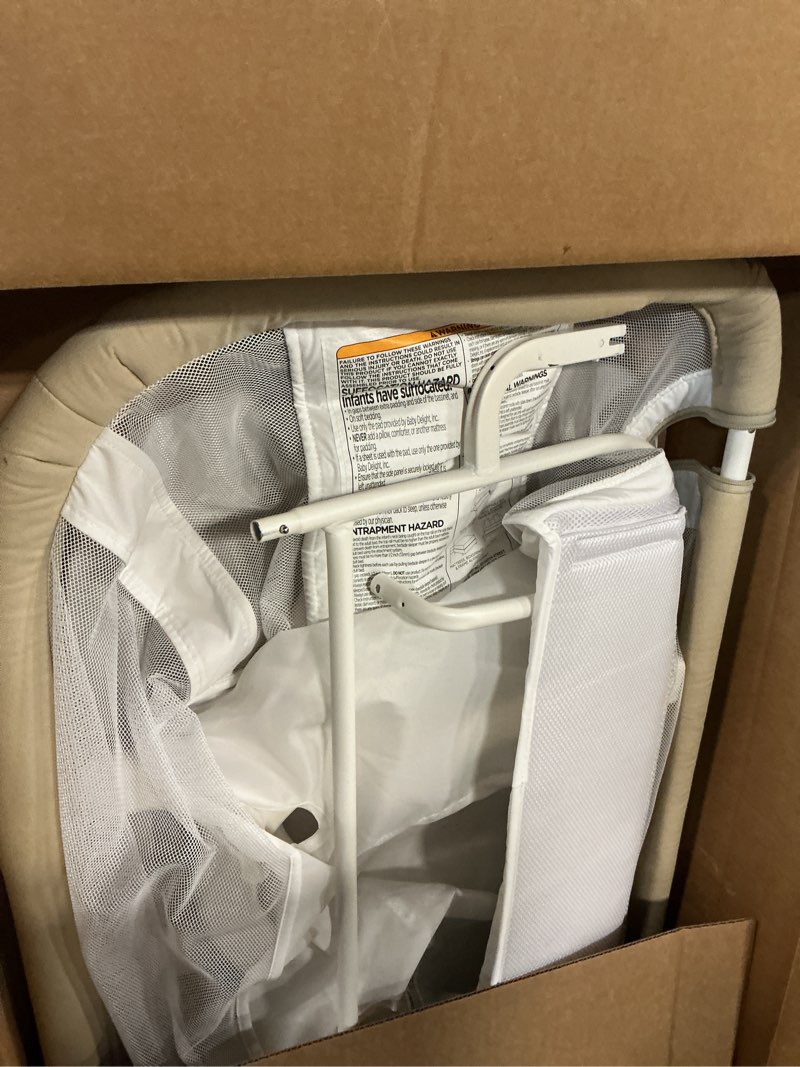 Condition photo showing As Is for Baby Delight Beside Me Dreamer Bassinet | Bedside Sleeper & Baby Bassinet | 6-Position Height Adjustment | Organic Oat