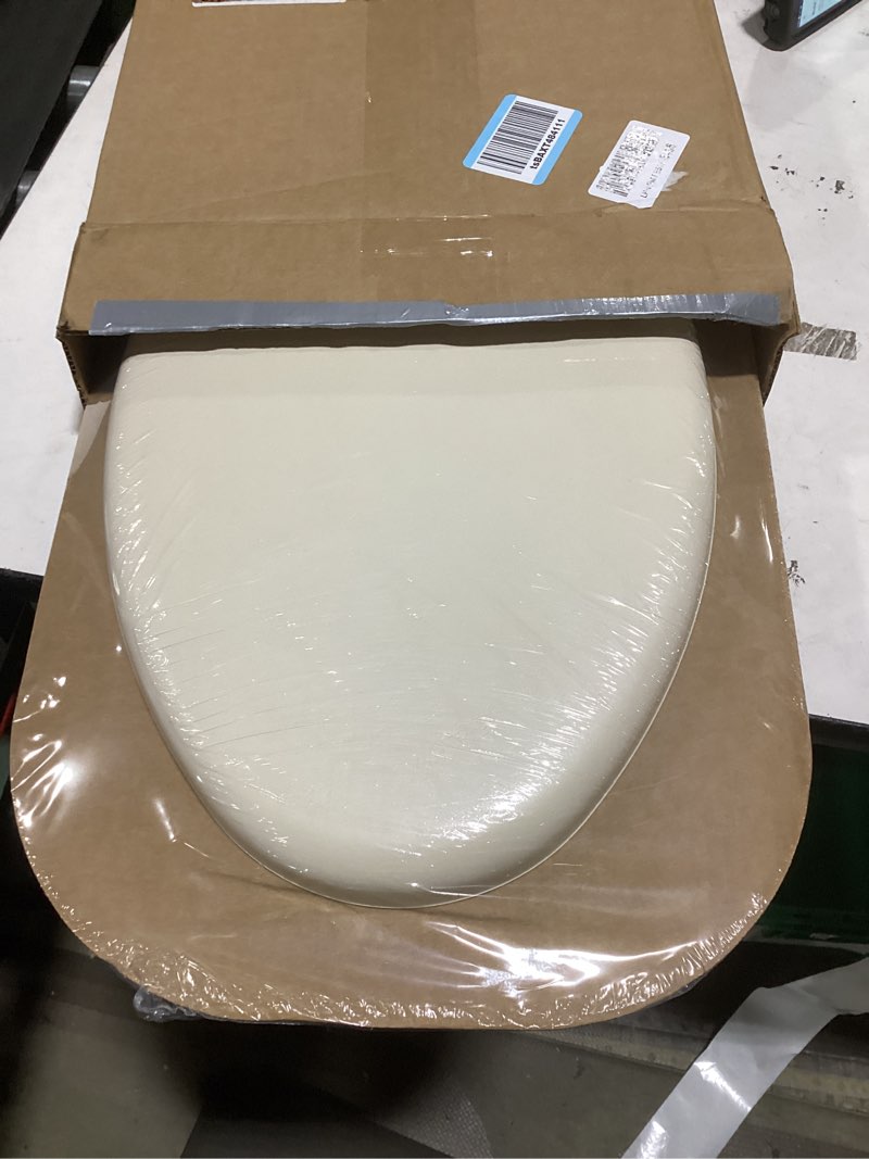 Condition photo showing New/Like New for Mayfair Padded Toilet Seat, Cushioned Soft Vinyl over Wood Core Seat, Secure Hinges, Easy Clean, Elongated, Bone Elongated Bone Toilet Seat