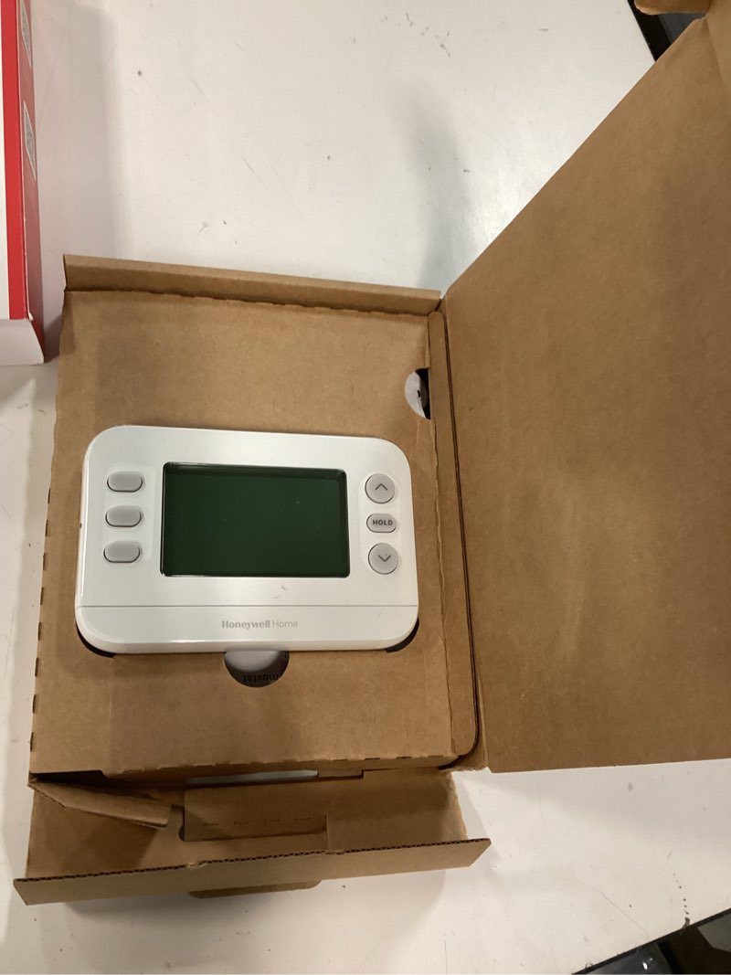 Condition photo showing New/Like New for honeywell home x2p heating and cooling push button programmable thermostat