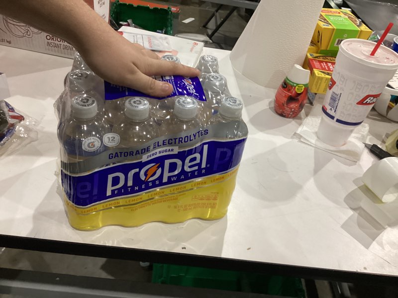 Condition photo showing New/Like New for Propel Electrolyte Enhanced Water Sports Drink, Lemon Flavored Water, Zero Calorie & Zero Sugar Hydration with Electrolytes and Vitamins C & E, 16.9 fl oz Bottles (12 Pack) Lemon 16.9 Fl Oz (Pack of 12)