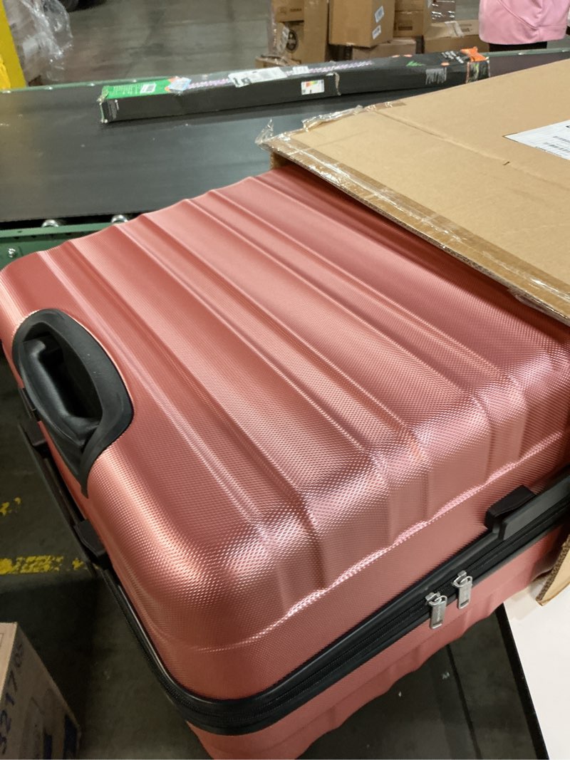 Condition photo showing Good Condition for Amazon Basics 30" Hardside Large Checked Luggage, Hardshell Suitcase With Wheels, Expandable For Up to 15% More Space, With Scratch-Resistant Surface, Four Multi-directional Wheels, Rose Gold Rose Gold Large Checked