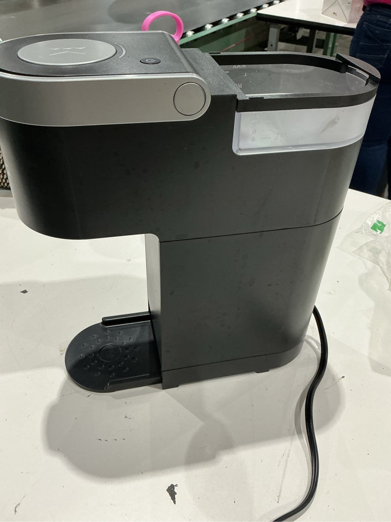 Condition photo showing As Is for keurig k-mini single serve k-cup pod coffee maker, 6 to 12oz brew size, with cord storage, perfect for small spaces, black